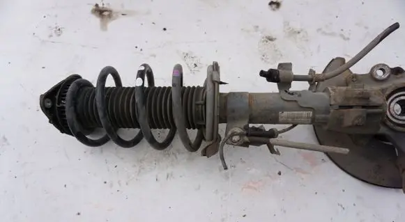 Ford C-MAX II Front shock absorber with coil spring MCPERSON