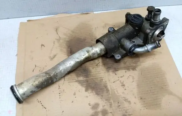 Thermostat/thermostat housing