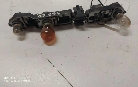 Volvo S60 Tail light bulb cover holder 153852 153854