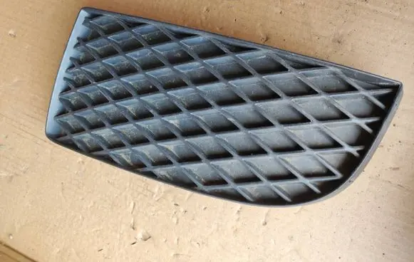 Mazda Premacy Front fog light trim/grill C14550C21