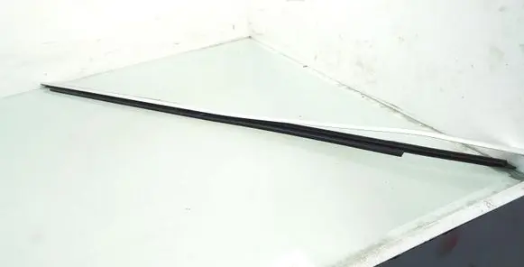 Front door glass trim molding