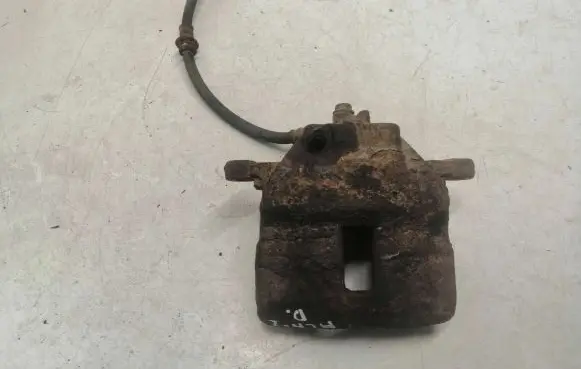 Nissan Almera N16 Front brake caliper
