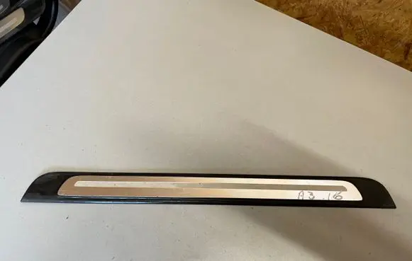Front sill trim cover
