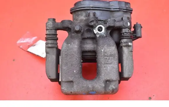 Opel Astra J Rear brake caliper 