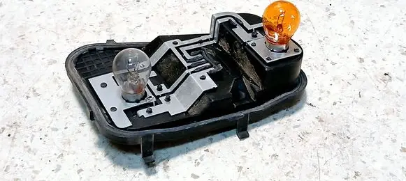 Volkswagen Touareg I Tail light bulb cover holder 7L6945257 28252102