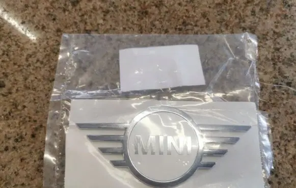 Mini One - Cooper R57 Manufacturer badge logo/emblem 7026186