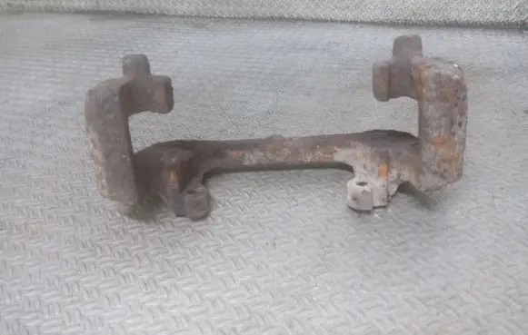 Volvo S80 Front Brake Caliper Pad/Carrier 