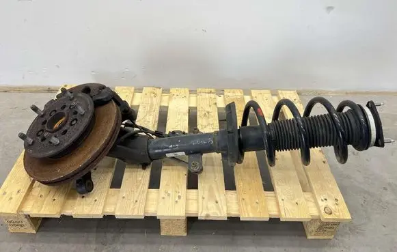 Front shock absorber with coil spring