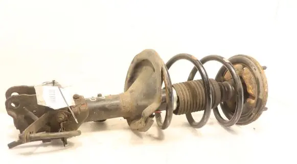 Front shock absorber with coil spring