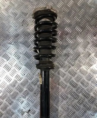 Volvo XC90 Front shock absorber with coil spring 31658004