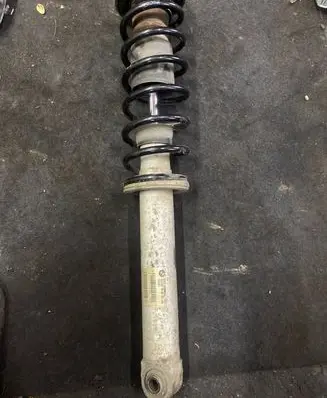 BMW 5 E60 E61 Rear shock absorber with coil spring 6766605