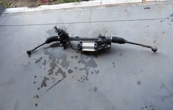 Volkswagen Touran I Steering rack 1K1423051DM 1K0909144E