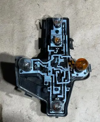 Volkswagen Touran I Tail light bulb cover holder 1T0945257D 1586871