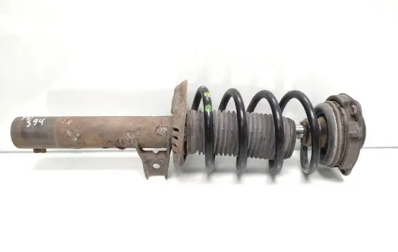 Front shock absorber with coil spring