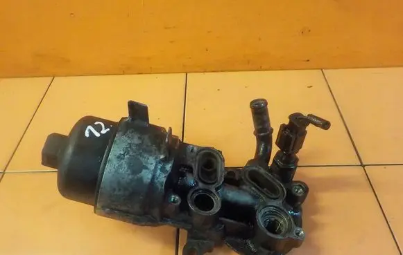 Ford Mondeo MK V Oil filter mounting bracket FL515