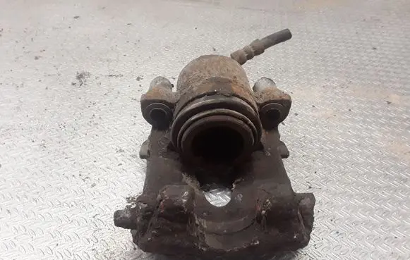 Skoda Fabia Mk2 (5J) Front brake caliper