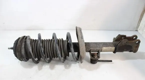 Opel Corsa D Front shock absorber with coil spring