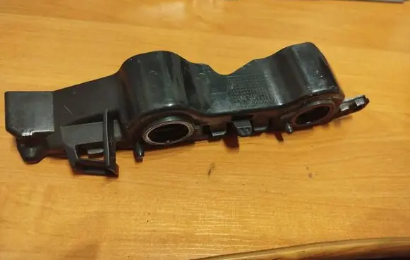 Front bumper mounting bracket