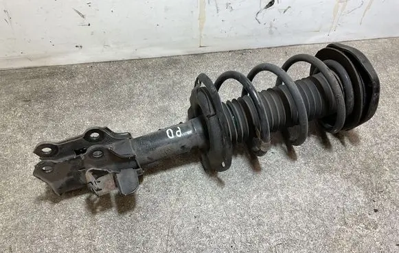 Front shock absorber with coil spring