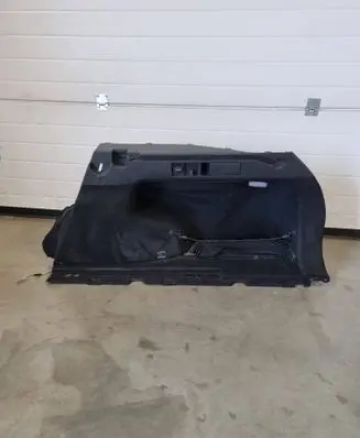 Trunk/boot lower side trim panel
