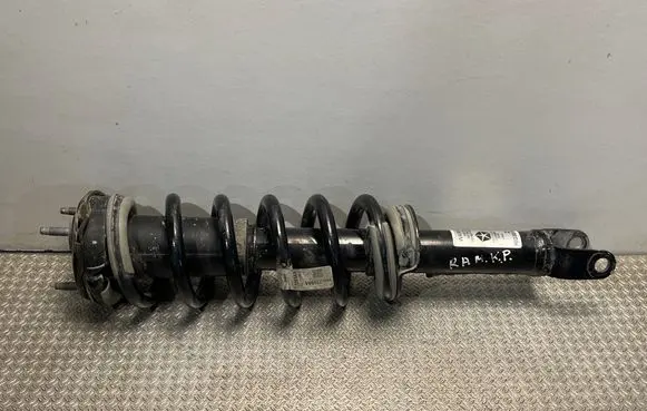 Front shock absorber with coil spring