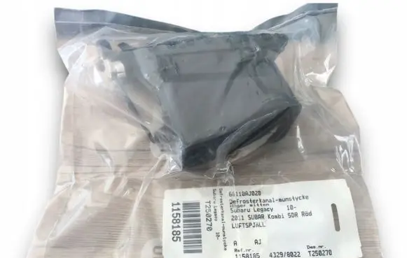 Subaru Legacy Dash center air vent grill 66110AJ020