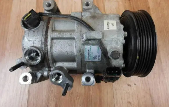 Hyundai Tucson TL Air conditioning (A/C) compressor (pump) 97701D7600 CA500NFJAA03