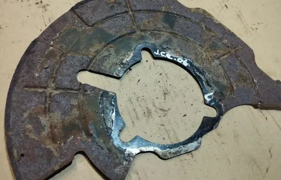 Jeep Grand Cherokee (WK) Front brake disc dust cover plate 