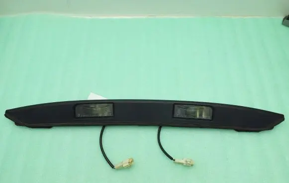Subaru Legacy Trunk door license plate light bar A046037