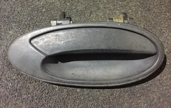 Mitsubishi Lancer Front door exterior handle mb819558