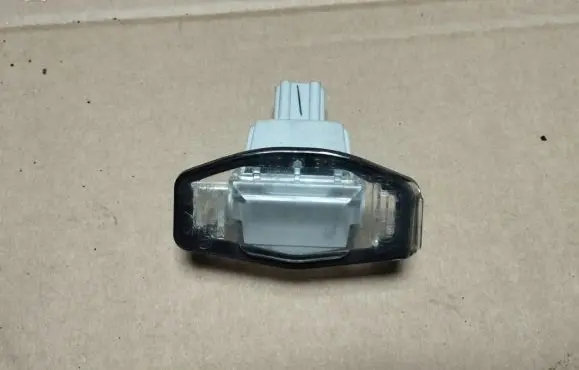 Honda Accord Number plate light A046037