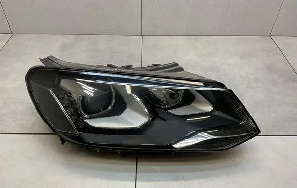 Volkswagen Touareg II Headlight/headlamp 7P2941752