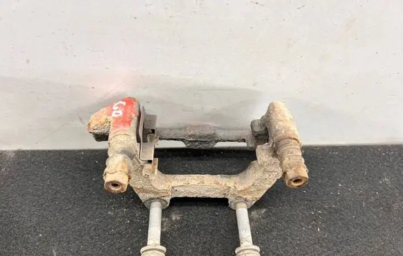 Audi A6 S6 C6 4F Brake caliper pad carrier rear 4F0615426D