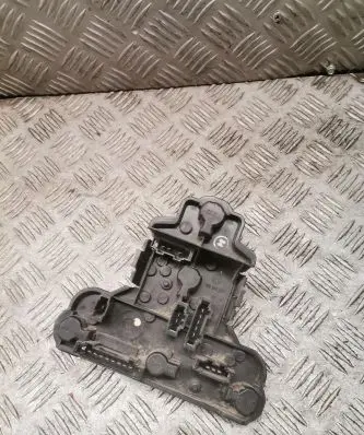 Tail light bulb cover holder
