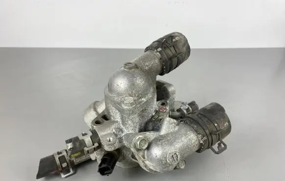 Thermostat/thermostat housing