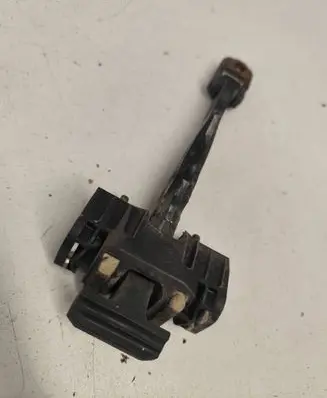 Opel Zafira B Front door check strap stopper 13227947