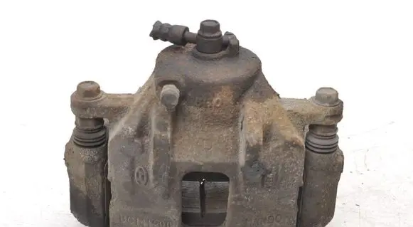 KIA Carens III Front brake caliper 