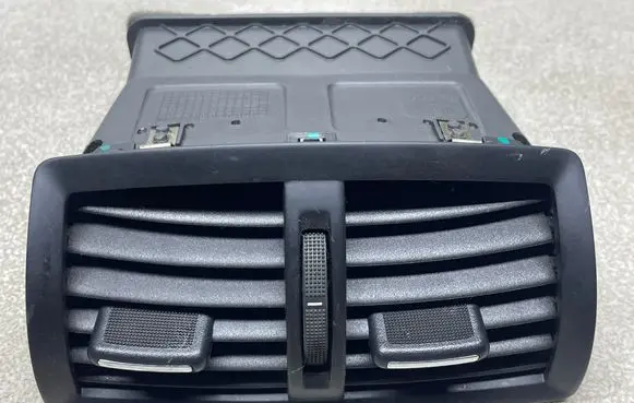 Dash center air vent grill