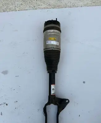 Jeep Grand Cherokee Front shock absorber with coil spring
