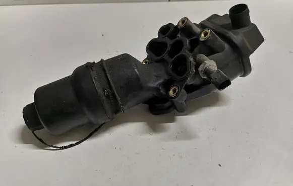 Volkswagen Eos Oil filter mounting bracket 06F115397H