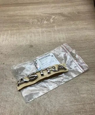 Opel Astra F Manufacturers badge/model letters 90510787