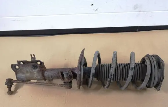 Nissan Qashqai Front shock absorber/damper 54303JD01A