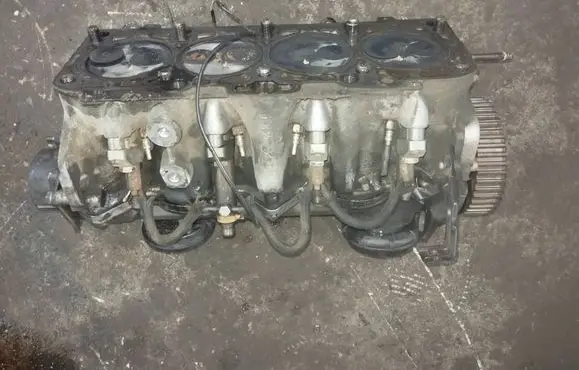 Volkswagen Golf IV Engine head 038103373E