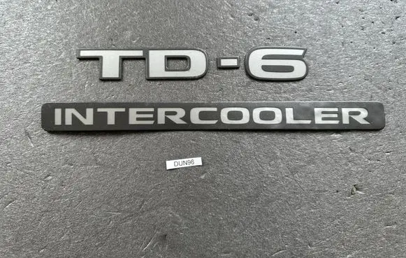Nissan Patrol Y61 Rear door emblem/model letters 90897VB500