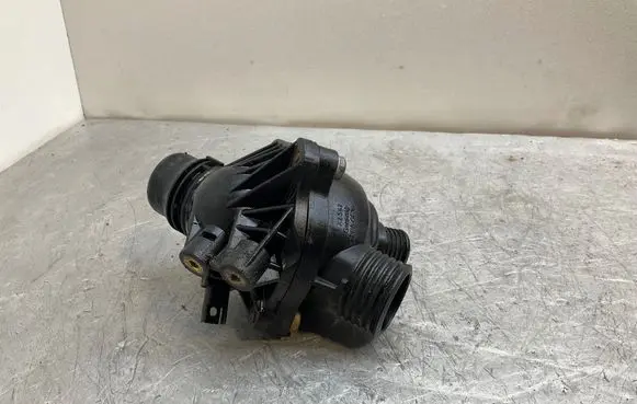 Thermostat/thermostat housing
