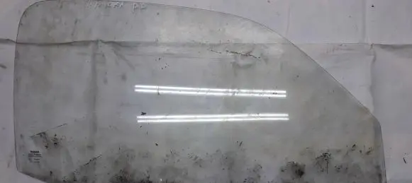 Nissan Micra Front door window glass four-door