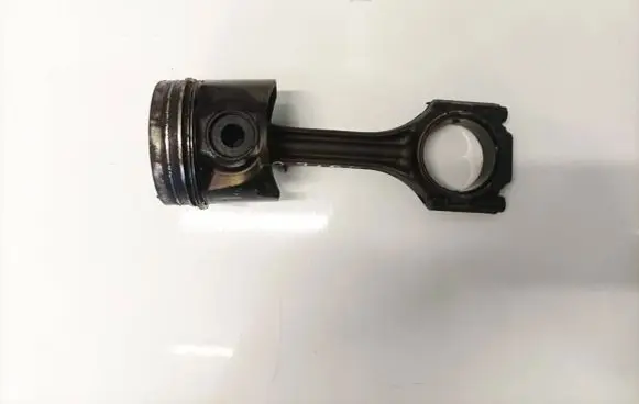 Piston with connecting rod