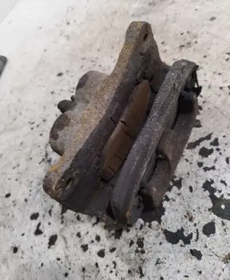 Subaru Impreza III Front brake caliper