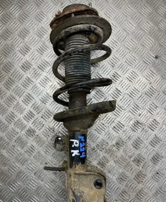 Subaru Legacy Front shock absorber with coil spring