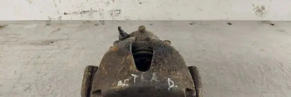 Opel Astra G Front brake caliper 